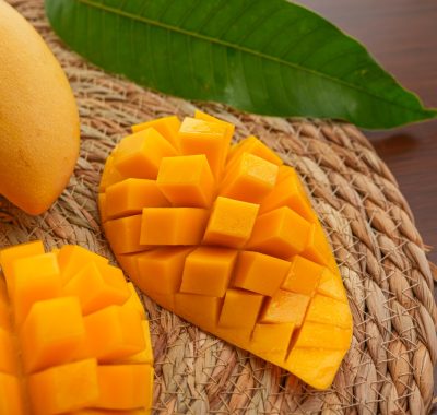 Ripe mango on wood,Ripe Mango Slice on wooden cutting board