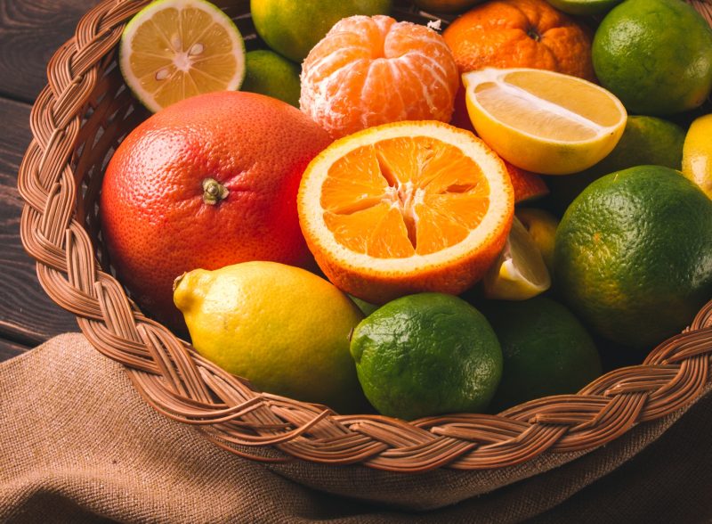 Assortment, citrus fruits, in a basket, close-up, top view, no people,